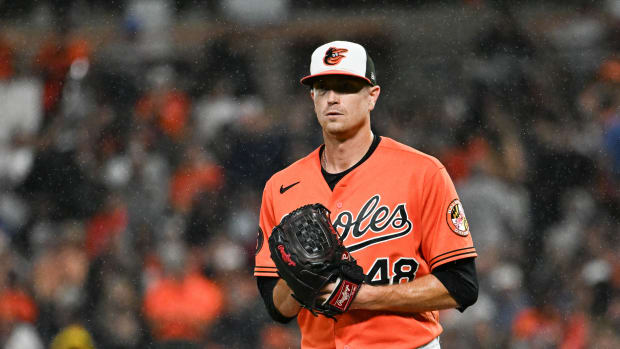 Sep 30, 2023; Baltimore, Maryland, USA; Baltimore Orioles starting pitcher Kyle Gibson (48) stands on the pitcher's mound as rain falls during the second inning against the Boston Red Sox at Oriole Park at Camden Yards. Mandatory Credit: Tommy Gilligan-USA TODAY Sports